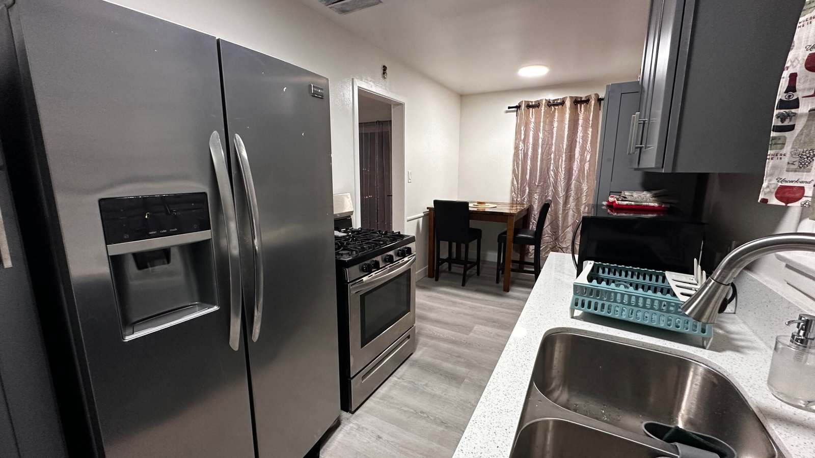 Bright furnished apartment kitchen with dining counter