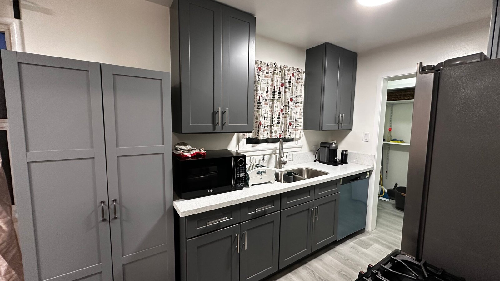 Second furnished apartment kitchen for extended stays