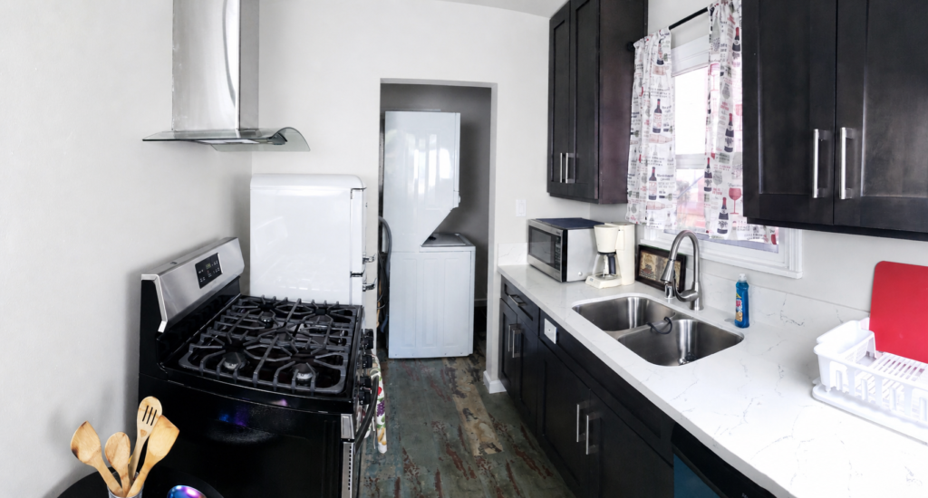 Second furnished apartment kitchen for extended stays