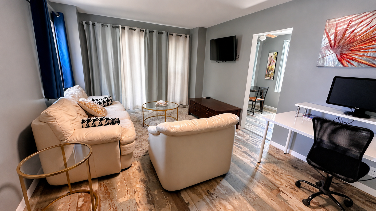 Furnished Los Angeles living room with desk and seating