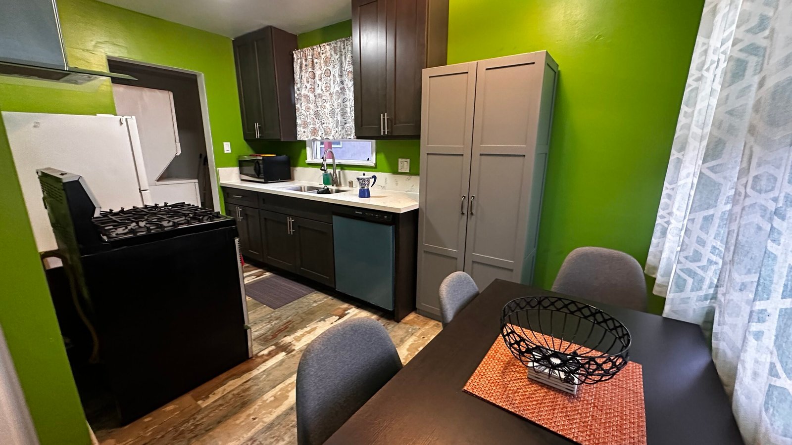 Furnished apartment kitchen and dining area